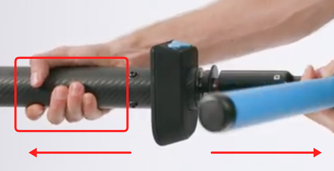 One hand on the tube behind the Bluetooth controller, arrows pulling handle and tube apart